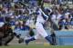 LOS ANGELES, CA - MAY 11: Dee Gordon #9 of the Los Angeles Dodgers hits a solo home run in the third inning against the Miami Marlins during the MLB game at Dodger Stadium on May 11, 2013 in Los Angeles, California. (Photo by Victor Decolongon/Getty Images)