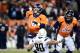 Dec 12, 2013; Denver, CO, USA; Denver Broncos quarterback Peyton Manning (18) prepares to pass as guard Zane Beadles (68) blocks on San Diego Chargers linebacker Thomas Keiser (90) in the fourth quarter at Sports Authority Field at Mile High. The San Diego Chargers defeated the Denver Broncos 27-20. Mandatory Credit: Ron Chenoy-USA TODAY Sports
