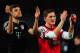 LONDON, ENGLAND - FEBRUARY 19: Thomas Mueller and Bastian Schweinsteiger of Bayern Muenchen applaud the fans after the UEFA Champions League round of 16 first leg match between Arsenal and Bayern Muenchen at Emirates Stadium on February 19, 2013 in London, England. (Photo by Shaun Botterill/Getty Images)