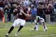 COLLEGE STATION, TX - NOVEMBER 09: Johnny Manziel #2 of the Texas A&M Aggies drops back to pass in the first half during the game against the Mississippi State Bulldogs at Kyle Field on November 9, 2013 in College Station, Texas. (Photo by Scott Halleran/Getty Images)
