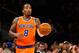 Dec 1, 2013; New York, NY, USA; New York Knicks shooting guard J.R. Smith (8) advances the ball during the first quarter against the New Orleans Pelicans at Madison Square Garden. Mandatory Credit: Anthony Gruppuso-USA TODAY Sports