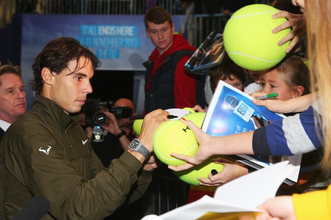 Hi-res-187566117-rafael-nadal-of-spain-signs-autographs-after-his-mens_crop_north