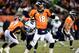 Dec 12, 2013; Denver, CO, USA; Denver Broncos quarterback Peyton Manning (18) passes in the third quarter against the San Diego Chargers at Sports Authority Field at Mile High. The San Diego Chargers defeated the Denver Broncos 27-20. Mandatory Credit: Ron Chenoy-USA TODAY Sports