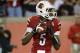 Oct 10, 2013; Louisville, KY, USA; Louisville Cardinals quarterback Teddy Bridgewater (5) drops back to pass against the Rutgers Scarlet Knights during the first quarter at Papa John's Cardinal Stadium. Mandatory Credit: Jamie Rhodes-USA TODAY Sports