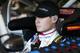 FORT WORTH, TX - NOVEMBER 01: Kyle Larson, driver of the #51 Dallas Convention & Visitors Bureau Chevrolet, sits in his car in the garage during practice for the NASCAR Sprint Cup Series AAA Texas 500 at Texas Motor Speedway on November 1, 2013 in Fort Worth, Texas. (Photo by Chris Graythen/Getty Images for Texas Motor Speedway)