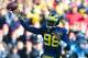Nov 30, 2013; Ann Arbor, MI, USA; Michigan Wolverines quarterback Devin Gardner (98) throws a pass during the first quarter against the Ohio State Buckeyes at Michigan Stadium. Mandatory Credit: Andrew Weber-USA TODAY Sports