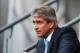 MANCHESTER, ENGLAND - NOVEMBER 24: Manuel Pellegrini, manager of Manchester City looks on prior to the Barclays Premier League match between Manchester City and Tottenham Hotspur at Etihad Stadium on November 24, 2013 in Manchester, England. (Photo by Alex Livesey/Getty Images)
