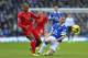 LIVERPOOL, ENGLAND - NOVEMBER 23: James McCarthy of Everton competes with Glen Johnson of Liverpool during the Barclays Premier League match between Everton and Liverpool at Goodison Park on November 23, 2013 in Liverpool, England. (Photo by Alex Livesey/Getty Images)