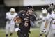 DEKALB, IL - NOVEMBER 26: Quarterback Jordan Lynch #6 of the Northern Illinois Huskies carries the ball during the second quarter against the Western Michigan Broncos at Huskie Stadium on November 26, 2013 in DeKalb, Illinois. Northern Illinois defeated Western Michigan 33-14. (Photo by Brian Kersey/Getty Images)