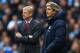MANCHESTER, ENGLAND - DECEMBER 14: Arsene Wenger manager of Arsenal and Manuel Pellegrini manager of Manchester City look on during the Barclays Premier League match between Manchester City and Arsenal at Etihad Stadium on December 14, 2013 in Manchester, England. (Photo by Richard Heathcote/Getty Images)
