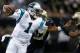 NEW ORLEANS, LA - DECEMBER 08: Quarterback Cam Newton #1 of the Carolina Panthers scrambles to escape the defense of Corey White #24 of the New Orleans Saints during the first quarter at Mercedes-Benz Superdome on December 8, 2013 in New Orleans, Louisiana. (Photo by Chris Graythen/Getty Images)