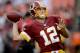 LANDOVER, MD - SEPTEMBER 09: Quarterback Kirk Cousins #12 of the Washington Redskins throws the ball before taking on the Philadelphia Eagles at FedExField on September 9, 2013 in Landover, Maryland. (Photo by Patrick Smith/Getty Images)