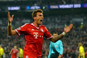 Hi-res-169476639-mario-mandzukic-of-bayern-muenchen-celebrates-after_crop_north