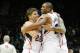 Dec 13, 2013; Atlanta, GA, USA; Atlanta Hawks shooting guard Kyle Korver (26) and center Al Horford (15) celebrate a victory against the Washington Wizards in overtime at Philips Arena. The Hawks defeated the Wizards 101-99. Mandatory Credit: Brett Davis-USA TODAY Sports