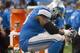 DETROIT, MI - DECEMBER 16: Tackle Corey Hilliard #78 of the Detroit Lions hangs his head on the bench during the final seconds of the second half against the Baltimore Ravens at Ford Field on December 16, 2013 in Detroit, Michigan. The Ravens defeated the Lions 18-16. (Photo by Jason Miller/Getty Images)