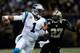 NEW ORLEANS, LA - DECEMBER 08: Cam Newton #1 of the Carolina Panthers is tackled by Malcolm Jenkins #27 of the New Orleans Saints at Mercedes-Benz Superdome on December 8, 2013 in New Orleans, Louisiana. (Photo by Chris Graythen/Getty Images)