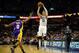Dec 17, 2013; Memphis, TN, USA; Memphis Grizzlies small forward Mike Miller (13) shoots the ball over Los Angeles Lakers small forward Nick Young (0) at FedExForum. Mandatory Credit: Justin Ford-USA TODAY Sports