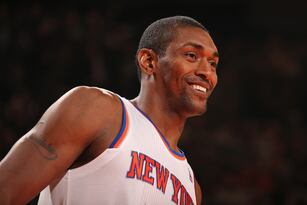 Hi-res-188098906-metta-world-peace-of-the-new-york-knicks-smiles-during_crop_north