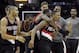 Dec 17, 2013; Cleveland, OH, USA; Portland Trail Blazers point guard Damian Lillard (front right) is swarmed by his teammates after making a game-winning, three-point basket against the Cleveland Cavaliers at Quicken Loans Arena. Mandatory Credit: David Richard-USA TODAY Sports