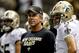 Aug 9, 2013; New Orleans, LA, USA; New Orleans Saints head coach Sean Payton talks with quarterback Drew Brees (9) before a preseason game against the Kansas City Chiefs at the Mercedes-Benz Superdome. Mandatory Credit: Derick E. Hingle-USA TODAY Sports