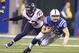 INDIANAPOLIS, IN - DECEMBER 15: Andrew Luck #12 of the Indianapolis Colts runs with the ball while defended by Joe Mays #53 of the Houston Texans during the NFL game at Lucas Oil Stadium on December 15, 2013 in Indianapolis, Indiana. (Photo by Andy Lyons/Getty Images)