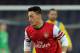 NAPLES, ITALY - DECEMBER 11: Mesut Oezil of Arsenal in action during the UEFA Champions League Group F match between SSC Napoli and Arsenal at Stadio San Paolo on December 11, 2013 in Naples, Italy. (Photo by Giuseppe Bellini/Getty Images)