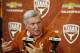 AUSTIN, TX - DECEMBER 15: University of Texas head football coach Mack Brown speaks at a press conference December 15, 2013 in Austin, Texas. Brown announced that he will step down as coach after the Valero Alamo Bowl game against Oregon on December 30. (Photo by Erich Schlegel/Getty Images)
