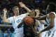 Wears stay hands off as Jordan Adams goes for the steal.