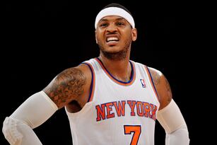 Hi-res-457225221-carmelo-anthony-of-the-new-york-knicks-looks-on-during_crop_north