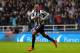 NEWCASTLE UPON TYNE, ENGLAND - NOVEMBER 02: Loic Remy of Newcastle United celebrates scoring their second goal during the Barclays Premier League match between Newcastle United and Chelsea at St James' Park on November 2, 2013 in Newcastle upon Tyne, England. (Photo by Shaun Botterill/Getty Images)