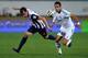 AGADIR, MOROCCO - DECEMBER 14: Cesar Delgado of Monterrey is challenged by Adil Karrouchy of Casablanca during the FIFA Club World Cup Quarterfinal match between Raja Casablanca and CF Monterrey at Agadir Stadium on December 14, 2013 in Agadir, Morocco. (Photo by Lars Baron/Getty Images)