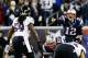 FOXBORO, MA - JANUARY 20: Tom Brady #12 of the New England Patriots makes an adjustment at the line against the Baltimore Ravens during the 2013 AFC Championship game at Gillette Stadium on January 20, 2013 in Foxboro, Massachusetts. (Photo by Jared Wickerham/Getty Images)