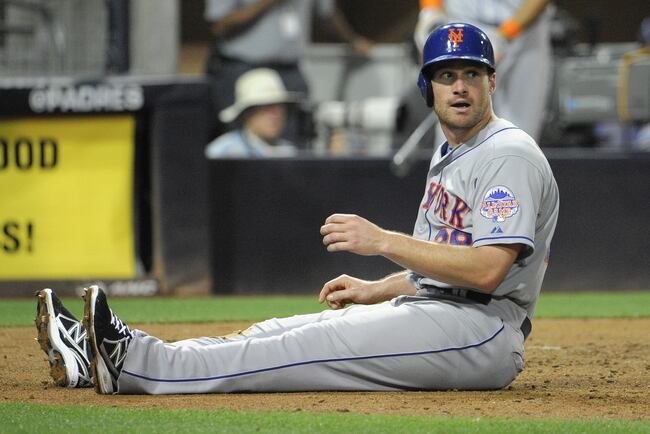 Hi-res-176588290-daniel-murphy-of-the-new-york-mets-looks-back-to-first_crop_north