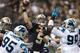 NEW ORLEANS, LA - DECEMBER 8: Drew Brees #9 of the New Orleans Saints throws a pass during a game against the Carolina Panthers at Mercedes-Benz Superdome on December 8, 2013 in New Orleans, Louisiana. The Saints defeated the Panthers 31-13. (Photo by Wesley Hitt/Getty Images)