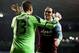 LONDON, ENGLAND - DECEMBER 18: Adrian (13) and Joey O'Brien of West Ham United celebrate victory after the Capital One Cup Quarter-Final match between Tottenham Hotspur and West Ham United at White Hart Lane on December 18, 2013 in London, England. (Photo by Paul Gilham/Getty Images)
