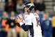 Oct 20, 2013; Indianapolis, IN, USA; Denver Broncos quarterback Peyton Manning (18) attempts to pass in the fourth quarter against the Indianapolis Colts at Lucas Oil Stadium. The Colts defeated the Broncos 39-33. Mandatory Credit: Ron Chenoy-USA TODAY Sports