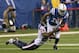 Dec 15, 2013; Indianapolis, IN, USA; Indianapolis Colts wide receiver T.Y. Hilton (13) catches a pass and is tackled by Houston Texans cornerback Johnathan Joseph (24) during the first quarter at Lucas Oil Stadium. Mandatory Credit: Pat Lovell-USA TODAY Sports