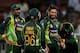 SHARJAH, UNITED ARAB EMIRATES - DECEMBER 18: Shahid Afridi shares a light moment with teamates on the field during the first One-Day International (ODI ) match between Sri Lanka and Pakistan at the Sharjah Cricket Stadium on December 18, 2013 in Sharjah, United Arab Emirates. (Photo by Francois Nel/Getty Images)