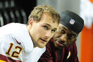 Hi-res-456888785-kirk-cousins-of-the-washington-redskins-chats-with_crop_north