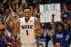Dec 3, 2013; Durham, NC, USA; Duke Blue Devils forward Jabari Parker (1) reacts after scoring against the Michigan Wolverines at Cameron Indoor Stadium. Mandatory Credit: Mark Dolejs-USA TODAY Sports