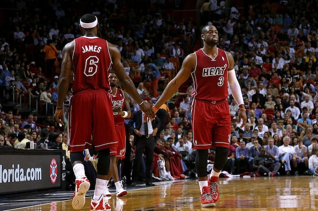 Miami Heat (2) - (7) New York Knicks [3-1] Hi-res-451988383-lebron-james-and-dwyane-wade-of-the-miami-heat-shake_crop_north