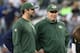 Dec 15, 2013; Arlington, TX, USA; Green Bay Packers head coach Mike McCarthy (right) talks with injured quarterback Aaron Rodgers on the sidelines during the game against the Dallas Cowboys at AT&T Stadium. Mandatory Credit: Matthew Emmons-USA TODAY Sports