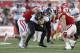 MADISON, WI - OCTOBER 12: Mike Jensen #80 of the Northwestern Wildcats makes the catch before getting tackled by Tanner McEvoy #17 of the Wisconsin Badgers during the second half of play at Camp Randall Stadium on October 12, 2013 in Madison, Wisconsin. (Photo by Mike McGinnis/Getty Images)