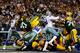 ARLINGTON, TX - DECEMBER 15: Running back Eddie Lacy #27 of the Green Bay Packers scores a fourth quarter touchdown against the Dallas Cowboys during a game at AT&T Stadium on December 15, 2013 in Arlington, Texas. The Green Bay Packers defeated the Dallas Cowboys 37-36. (Photo by Tom Pennington/Getty Images)