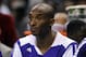 Dec 14, 2013; Charlotte, NC, USA; Los Angeles Lakers guard Kobe Bryant (24) watches his team from the bench during the first half of the game against the Los Angeles Lakers at Time Warner Cable Arena. Mandatory Credit: Sam Sharpe-USA TODAY Sports