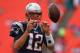 MIAMI GARDENS, FL - DECEMBER 15: Tom Brady #12 of the New England Patriots warms up during a game against the Miami Dolphins at Sun Life Stadium on December 15, 2013 in Miami Gardens, Florida. (Photo by Mike Ehrmann/Getty Images)