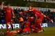 LONDON, ENGLAND - DECEMBER 15: Jon Flanagan of Liverpool is mobbed by his team mates after scoring their third goal during the Barclays Premier League match between Tottenham Hotspur and Liverpool at White Hart Lane on December 15, 2013 in London, England. (Photo by Paul Gilham/Getty Images)