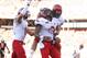 Aug 31, 2013; Corvallis, OR, USA; Teammates celebrate with Eastern Washington Eagles quarterback Vernon Adams (3) after scoring a touchdown against Oregon State Beavers at Reser Stadium. Mandatory Credit: Jaime Valdez-USA TODAY Sports