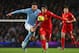 MANCHESTER, ENGLAND - FEBRUARY 03: Luis Suarez of Liverpool battles for the ball with Javi Garcia of Manchester City during the Barclays Premier League match between Manchester City and Liverpool at the Etihad Stadium on February 3, 2013 in Manchester, England. (Photo by Alex Livesey/Getty Images)