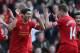 LIVERPOOL, ENGLAND - DECEMBER 21: Luis Suarez of Liverpool celebrates after scoring his second goal with team mate Jordan Henderson during the Barclays Premier League match between Liverpool and Cardiff City at Anfield at Anfield on December 21, 2013 in Liverpool, England. (Photo by Clive Brunskill/Getty Images)